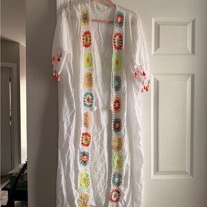 Rebellion white top with silver logo detailing